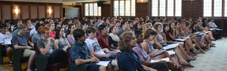 Undergraduate students in an assembly
