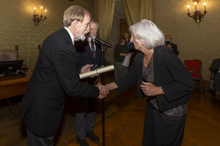 Jane Tylus receiving award